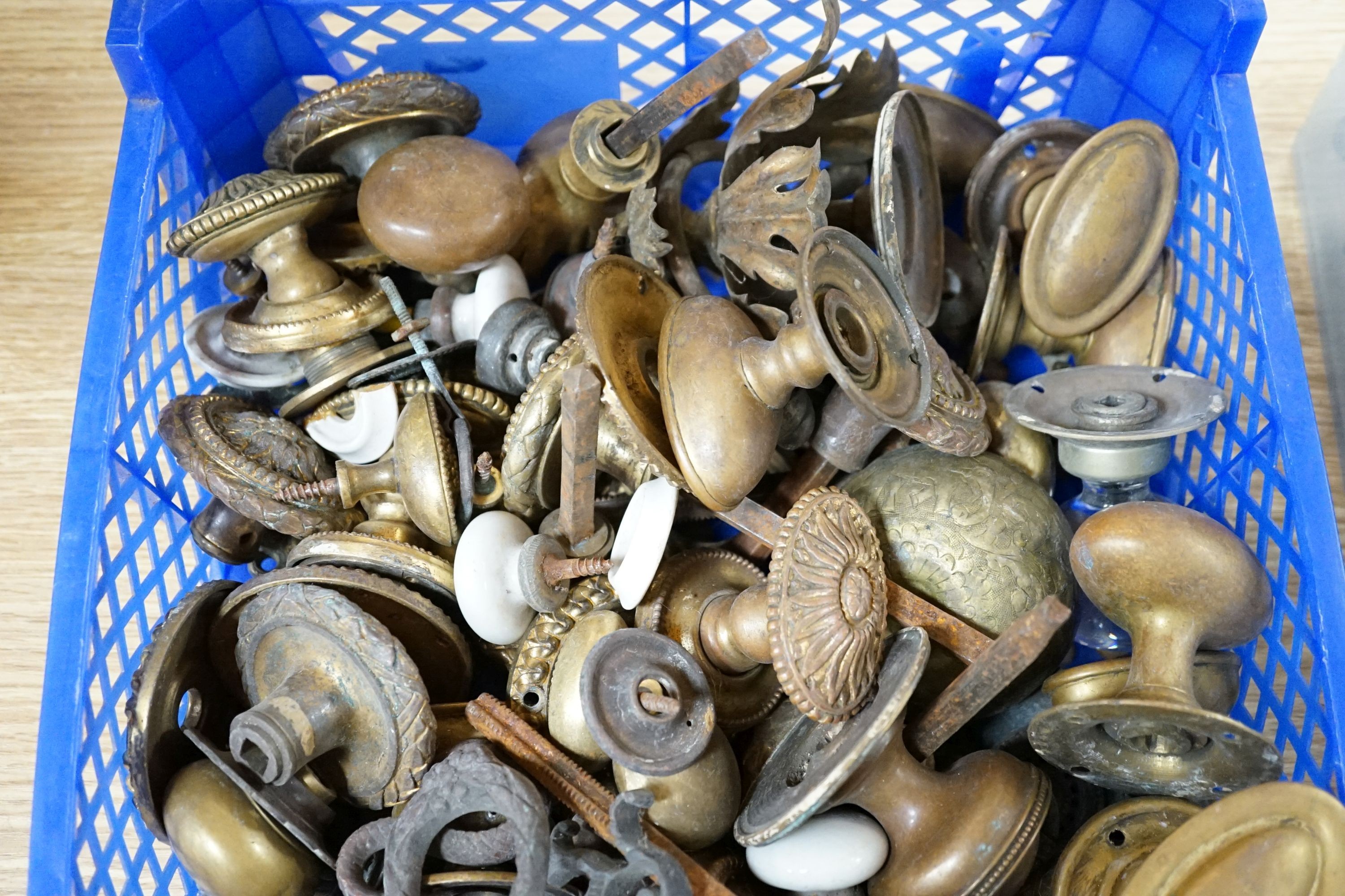 A quantity of decorative fittings and a quantity of various door knobs, etc.